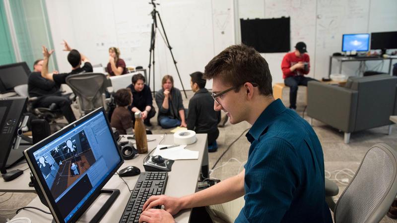 Student working a computer.