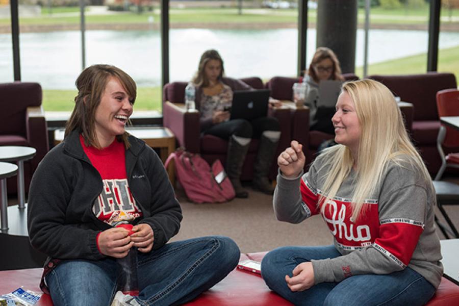 Two students conversing