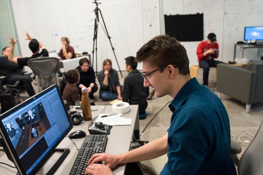Student working a computer.