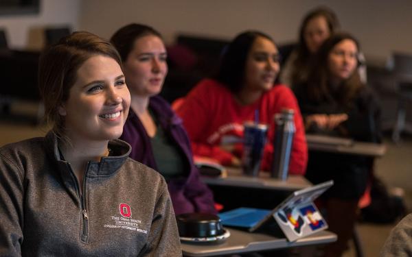 Students watch a presentation