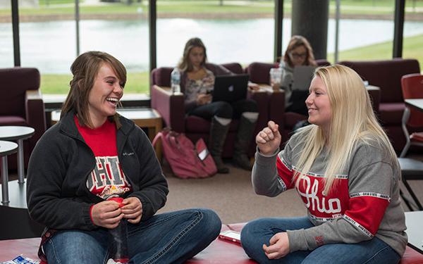 Two students conversing