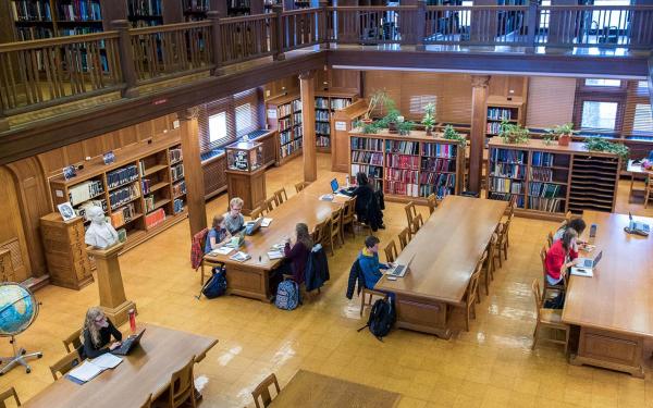 Students studying in library