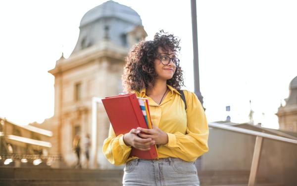 student with binder