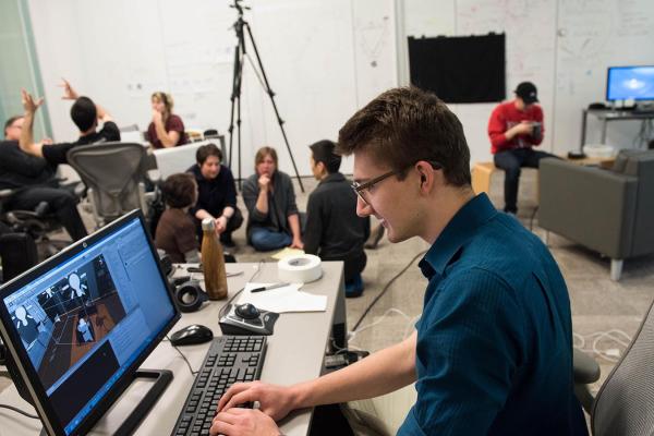 Student working a computer.