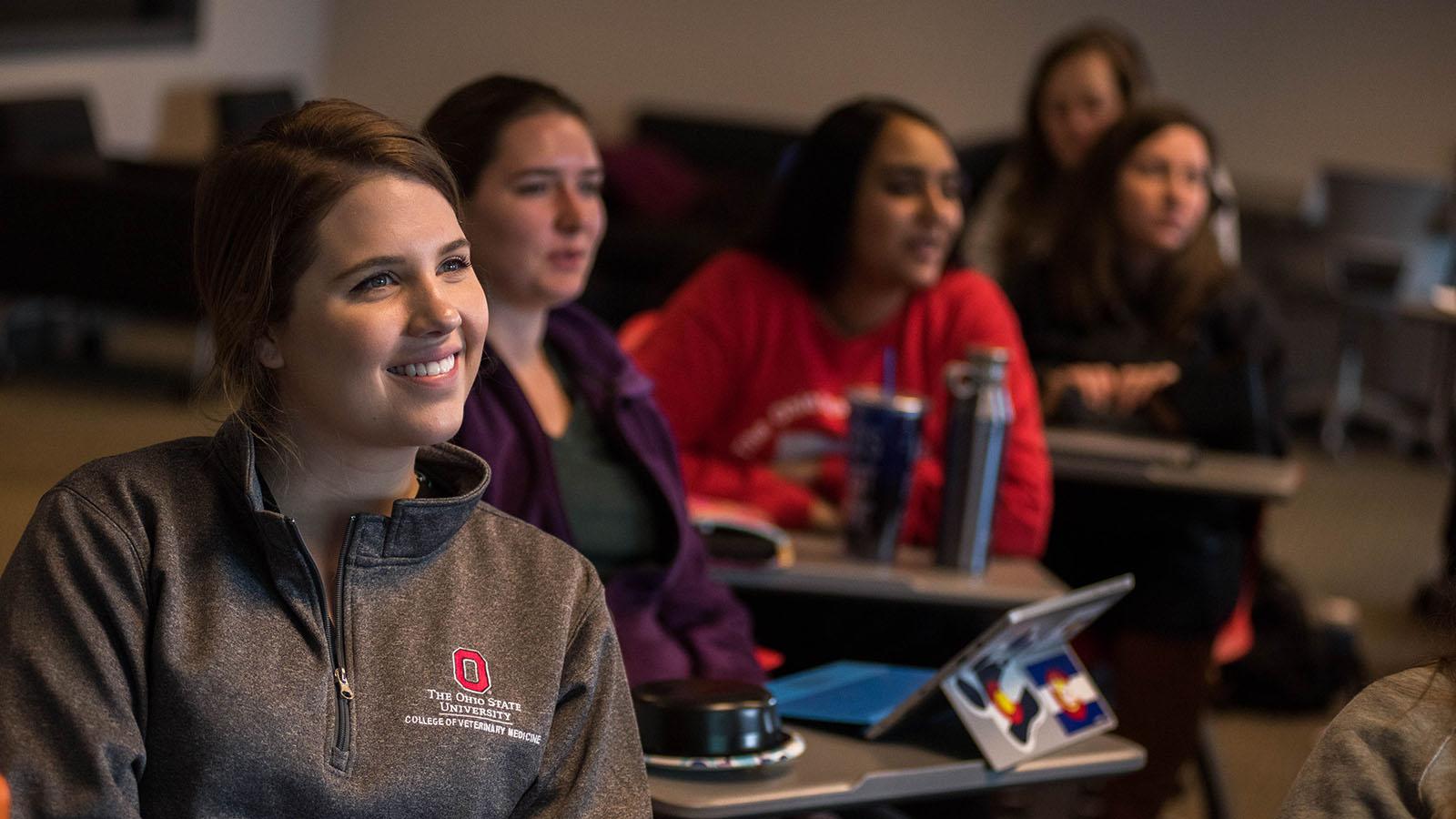 Students watch a presentation