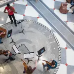 picture of a musical performance in front of a small audience.