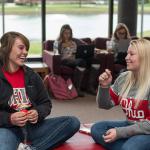 Two students conversing