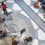 picture of a musical performance in front of a small audience.